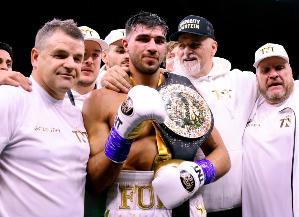 Tommy Fury celebrates his win over Jake Paul