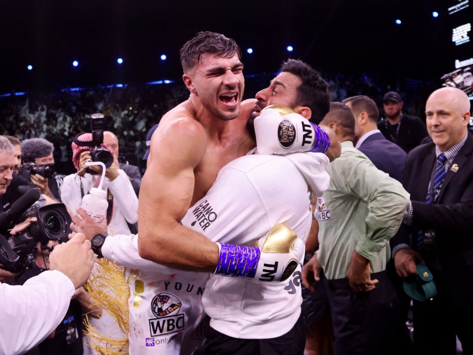 Tommy Fury celebrates beating Jake Paul