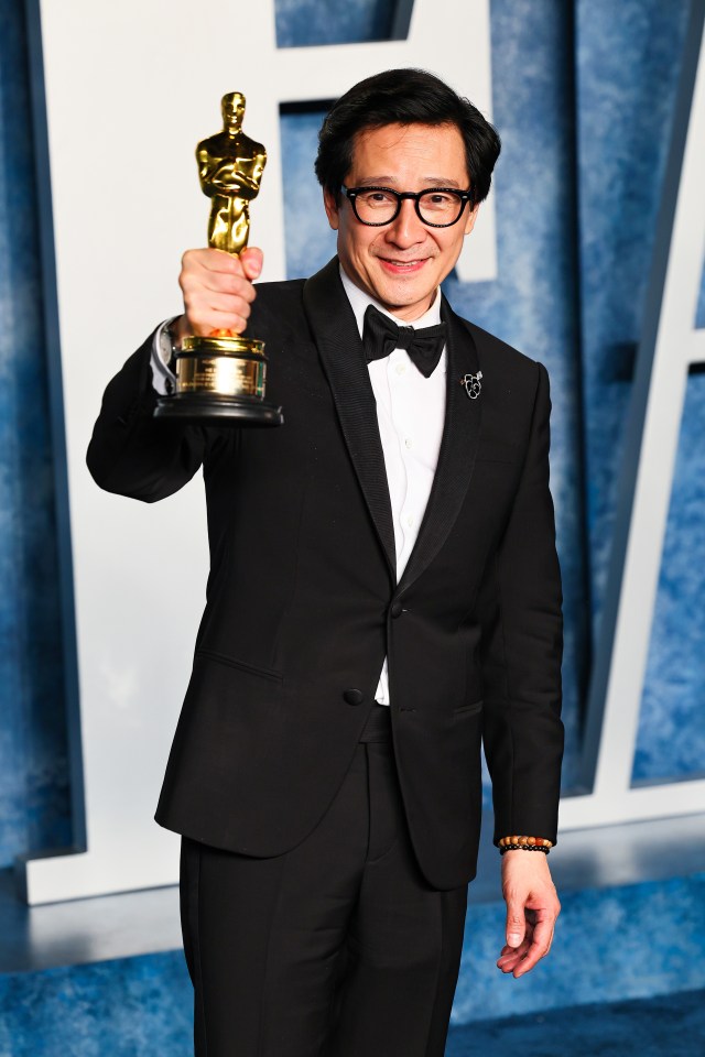 Ke Huy Quan with his Oscar for Everything Everywhere All at Once