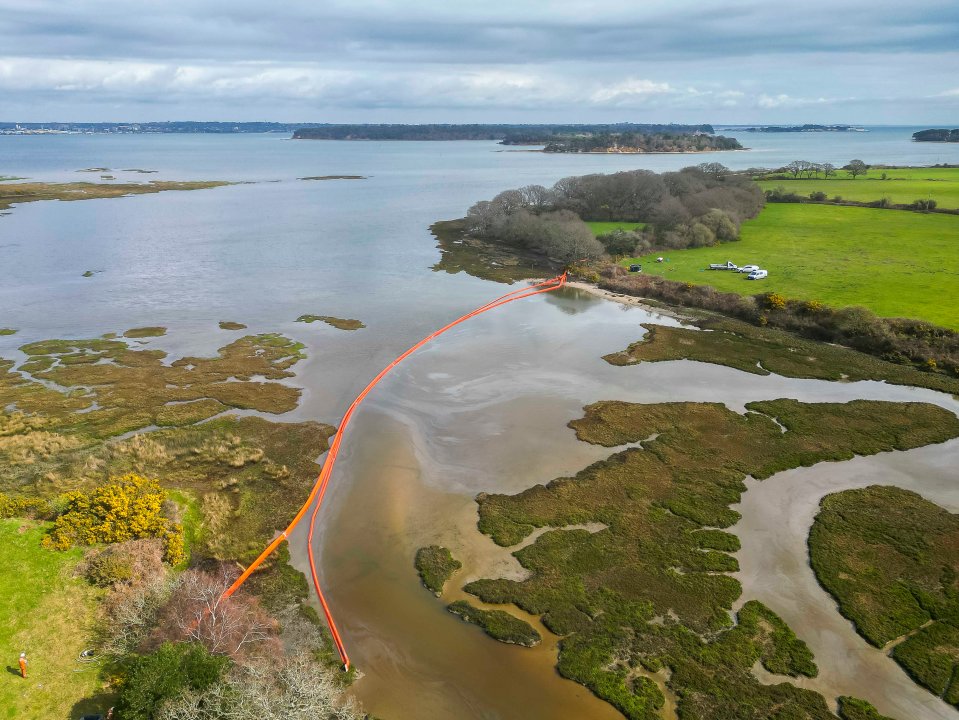 Oil flooded from pipes under the water at this point in Poole, Dorset