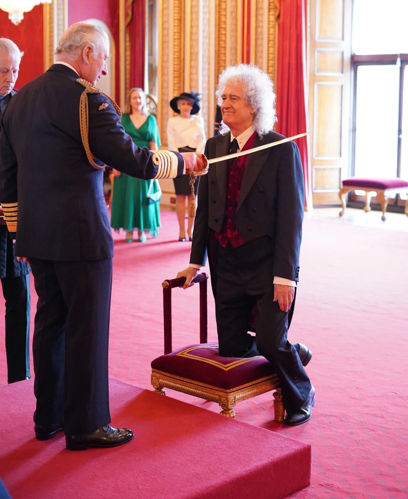 Brian May was knighted by King Charles at Buckingham Palace