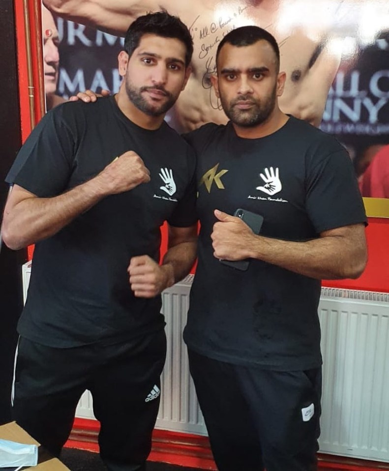 Mr Yakoob, pictured with boxer Amir Khan, says his advice is to get away from the 9-5