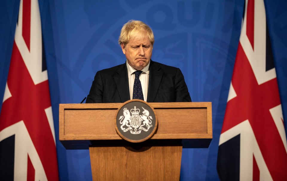 Then PM Boris Johnson holds a Covid press conference