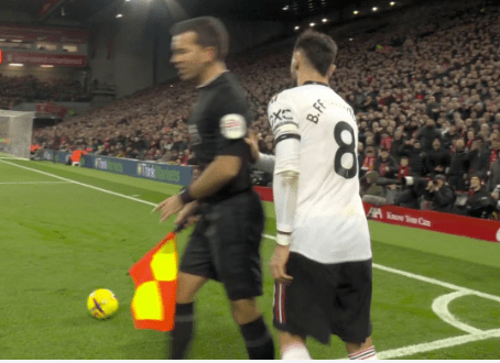 At one point Fernandes put his hand on the assistant referee