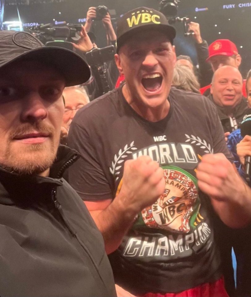 Oleksandr Usyk pictured with Tyson Fury