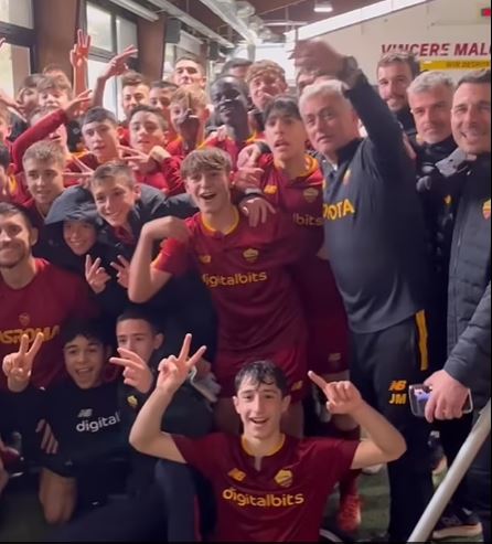 The Special One posed for a photo with the victorious Roma youngsters