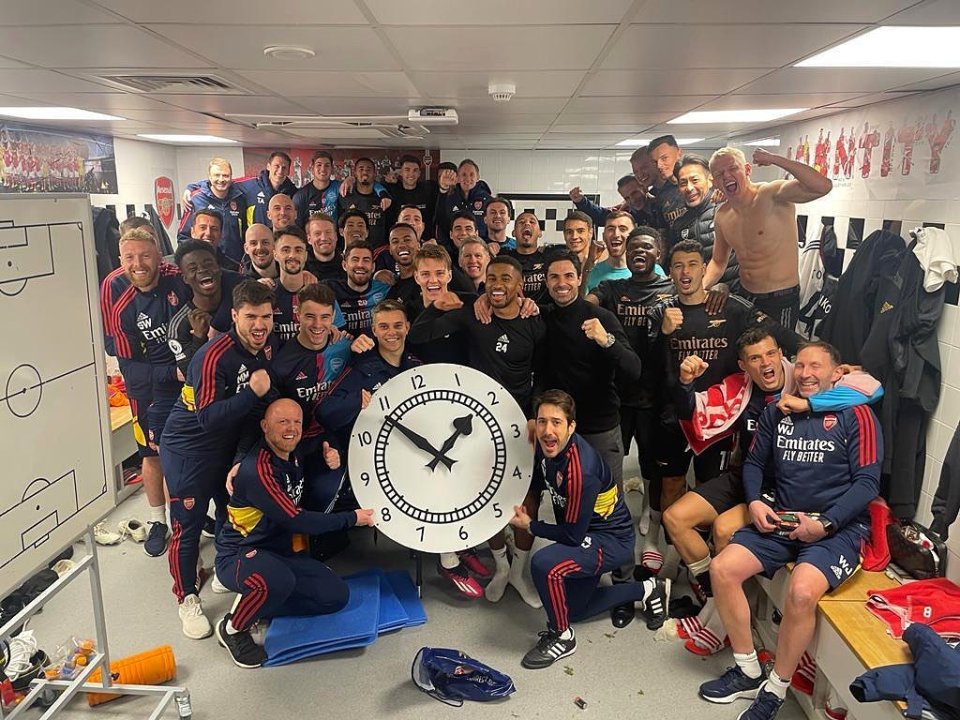 A giant clock can be seen at the centre of the away dressing room celebrations