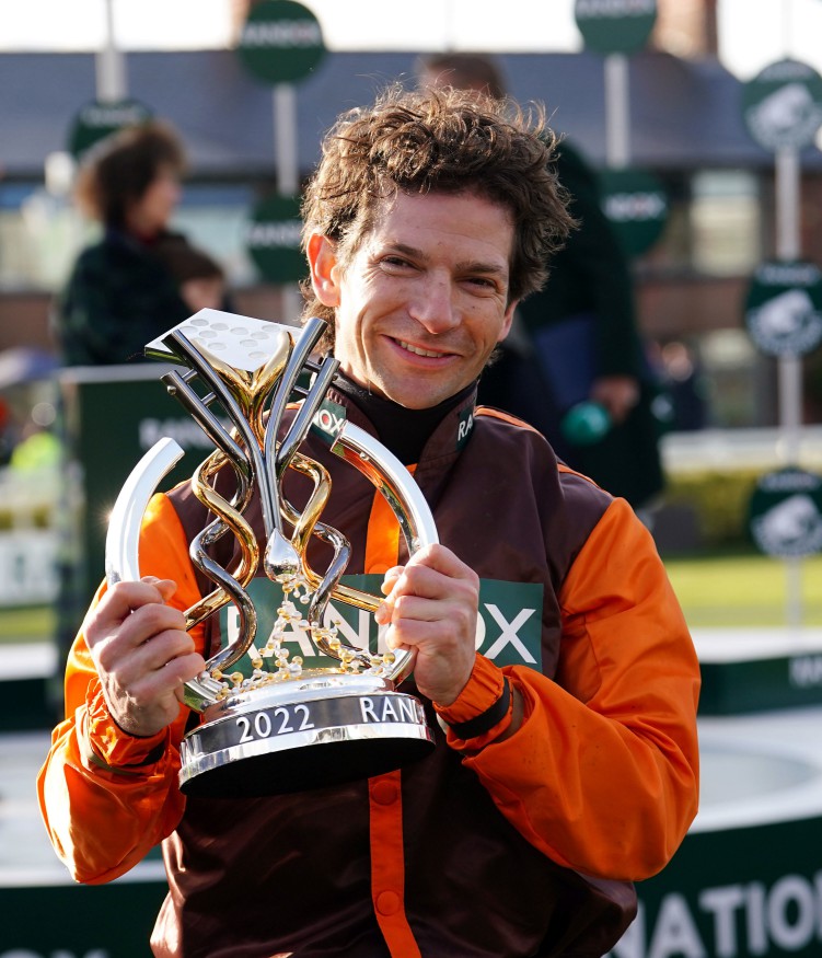 Jockey Sam Waley-Cohen with the trophy after winning the 2022 Randox Grand National Handicap Chase on Noble Yeats