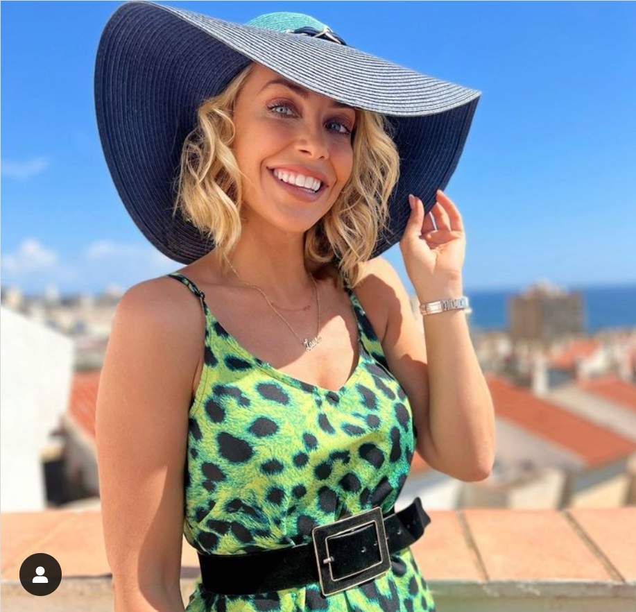 This time, she’s got fans swooning again after she shared a photo of herself beaming at the camera in a bold green and black leopard print strappy top