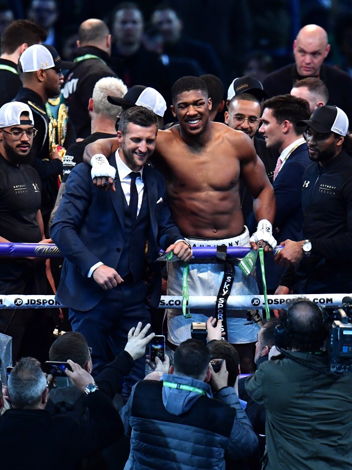 Anthony Joshua celebrates with Carl Froch in 2017