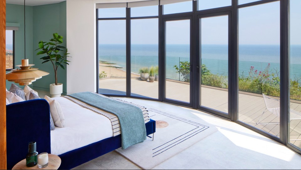 The master bedroom boasts 180 degree stunning coastal views