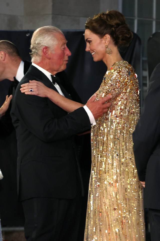 Charles and daughter-in-law Kate show their affection for each other at the premiere of James Bond film No Time To Die