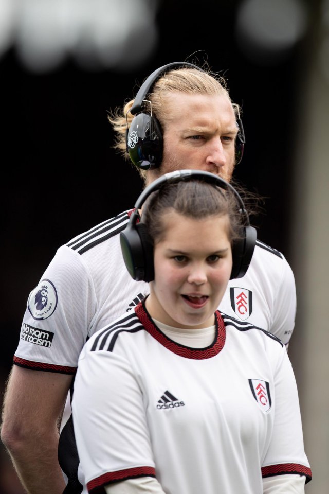 Tim Ream showed his support for a young mascot by wearing headphones