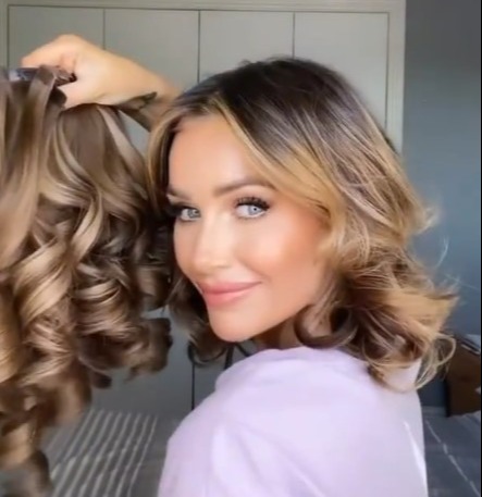 The glam star added length using her own brand extensions