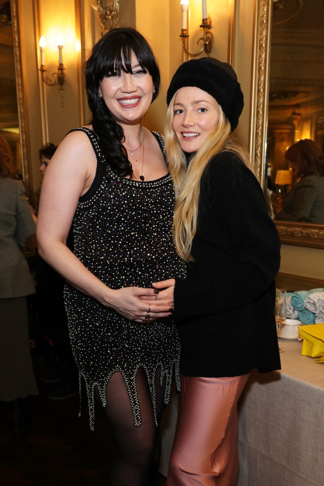 She posed with actress Clara Paget