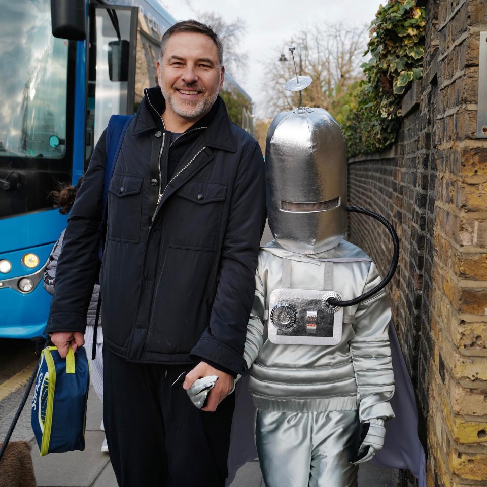 David looked very proud as they walked to school