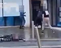 The footage shows a second victim lying unconscious on the ground