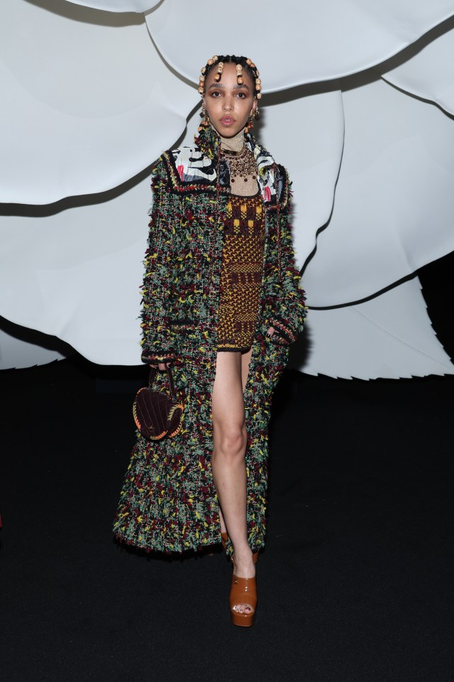 FKA Twigs wore this mini-dress and multi-coloured coat at Paris Fashion Week