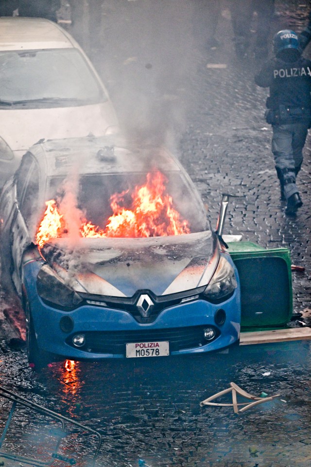 One police car was set on fire