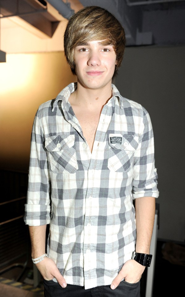 Liam, pictured in 2011,  shot to fame with this floppy do on The X Factor