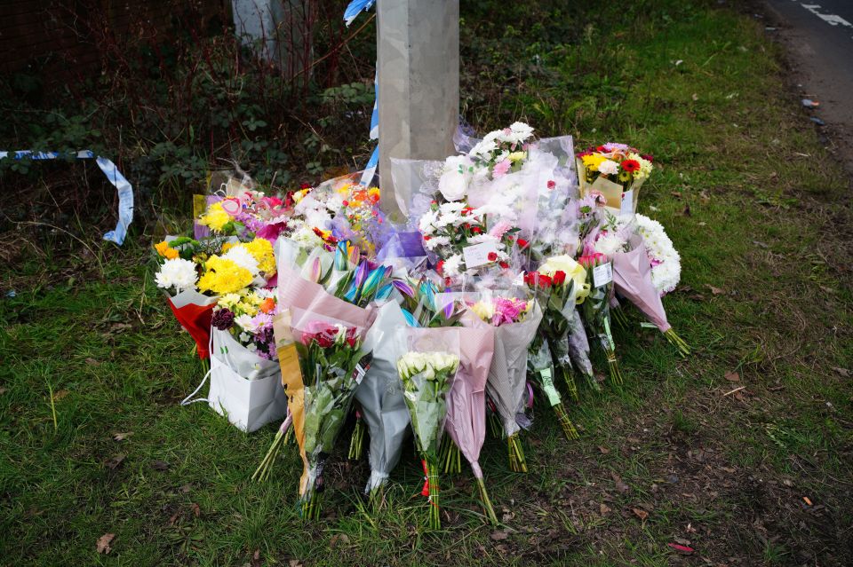 Floral tributes left near the scene in the St Mellons area of Cardiff