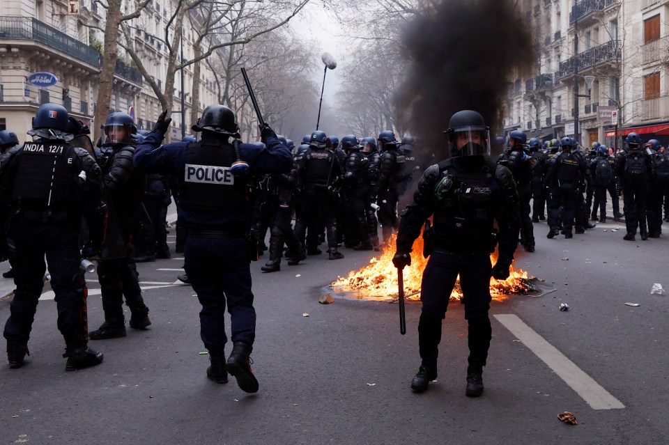 Riot cops during clashes on the tenth day of nationwide strikes and protests in Paris