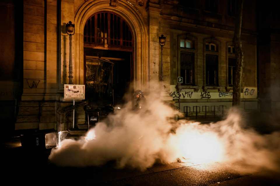 Crowds torched a town hall in France's third-largest city Lyon