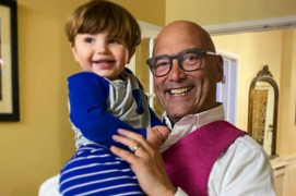 Gregg Wallace said he wants to focus his time on his little boy Sid, they are pictured together above