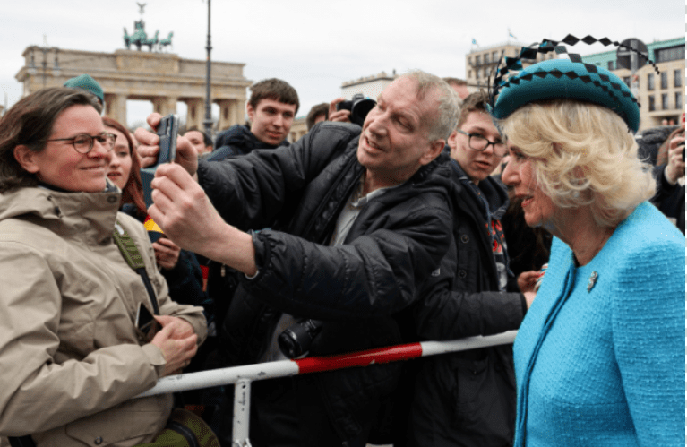 Queen Camilla stopped for a selfie with a well wisher