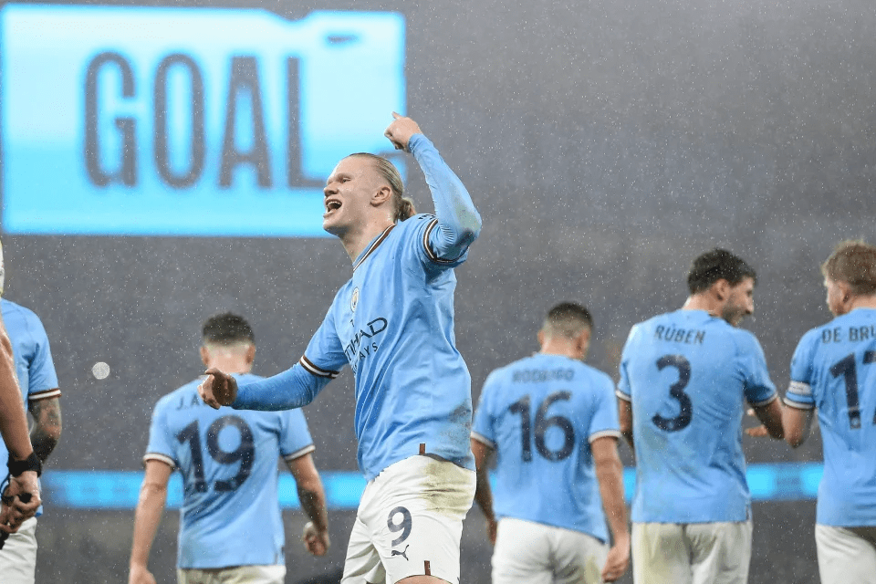 Erling Haaland celebrates as he follows his five goals vs Leipzig with a hat-trick as Man City chase a glorious Treble of their own