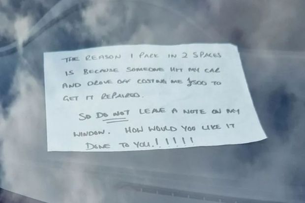 A driver leaves note on car saying why they parked across two spaces