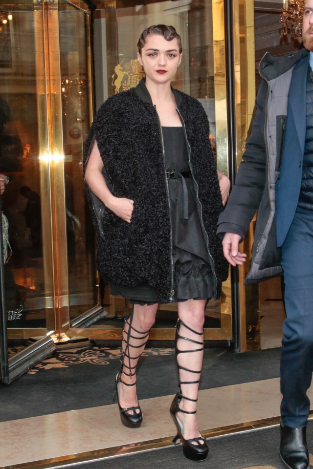 Game Of Thrones star Maisie Williams wore a belted dress with a gilet and lace up heels