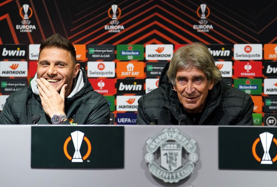 Real Betis’ skipper and winger Joaquin joins manager Manuel Pellegrini for a laugh in the press conference ahead of their big tie at Old Trafford