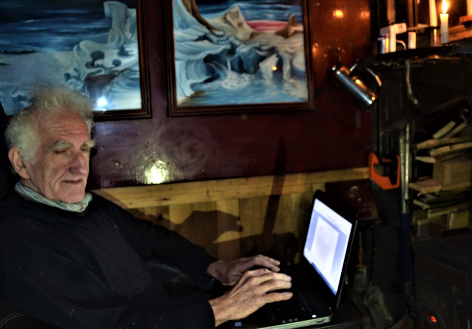 Mike isn't a fan of technology - but has a small laptop he uses to write novels