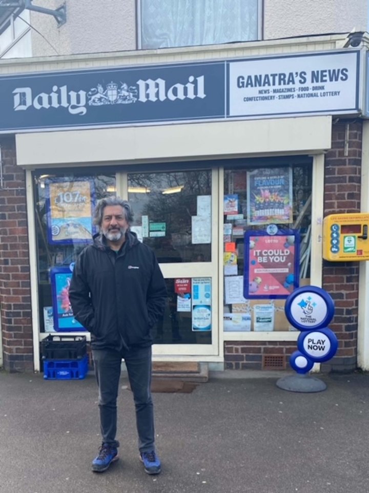 Nitin outside his family's newsagents