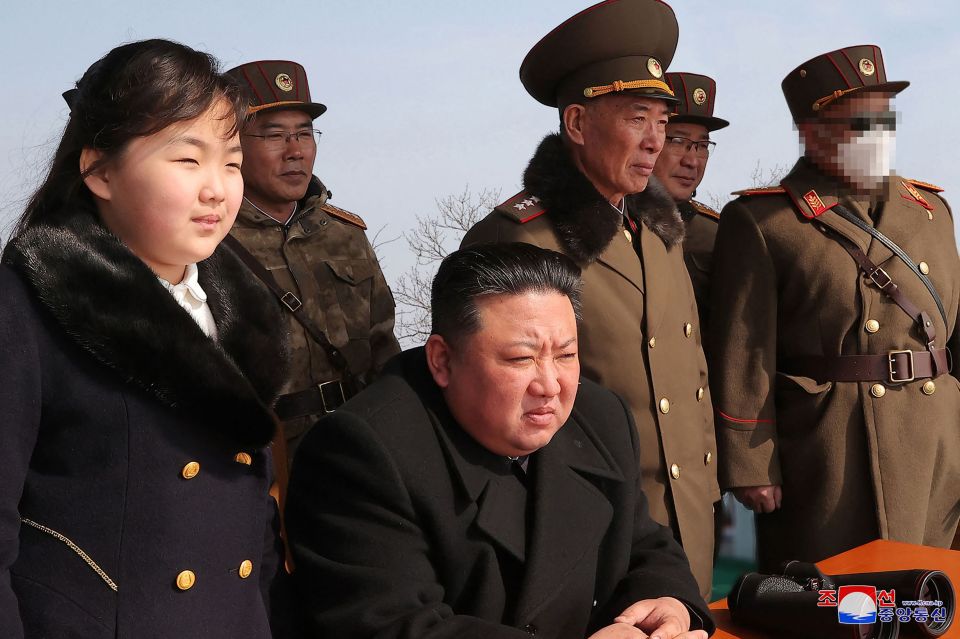 North Korea’s leader Kim Jong-un, centre, is said to have overseen the test firing and drills