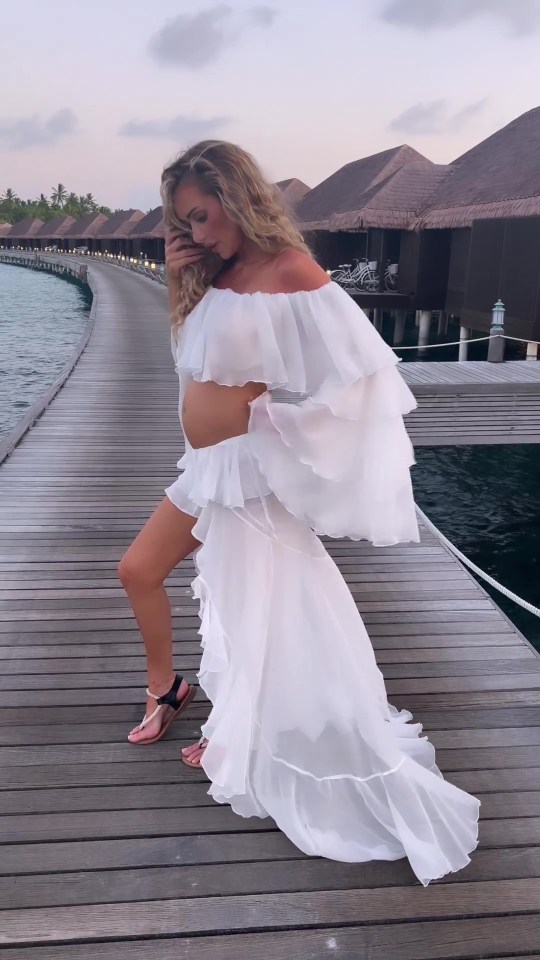 The star showed off her growing baby bump in the revealing outfit