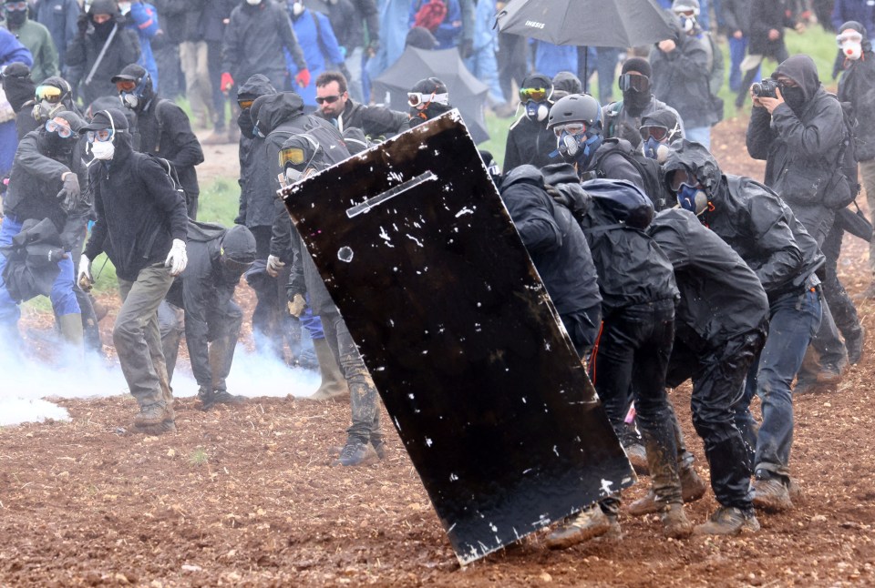 Protesters and riot police entered into a full-scale conflict