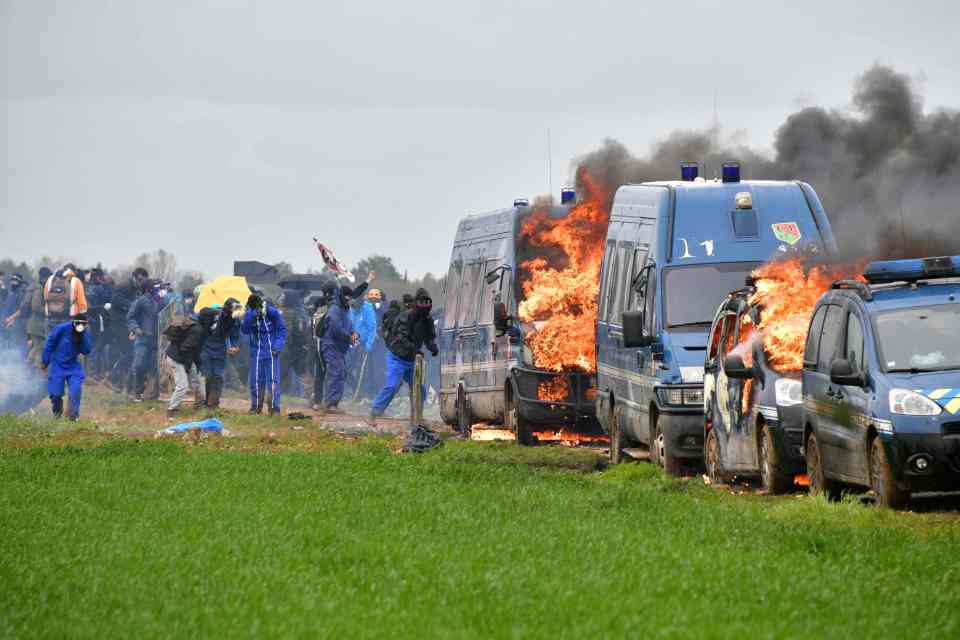 French police cars were set alight during a violent protest in western France