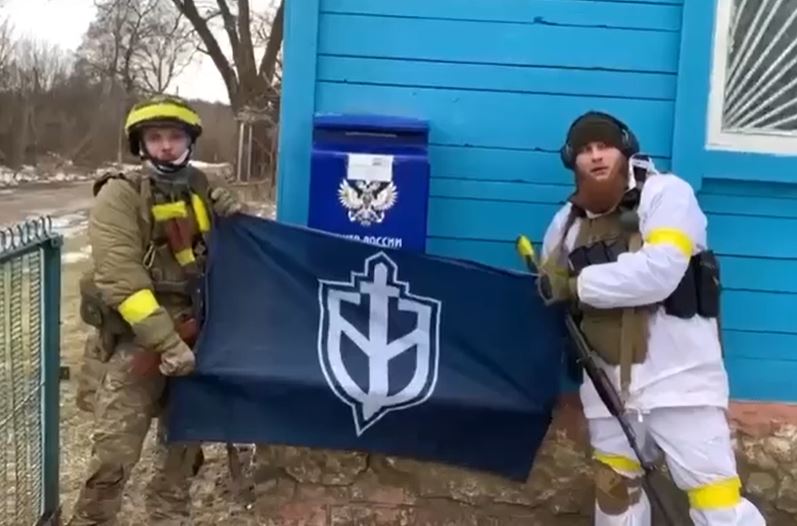 Footage has emergency appearing to show pro-Ukrainian fighters waving the flag of the Russian Volunteer Corps