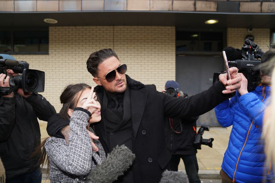 Bear posed for a selfie with a supporter outside court