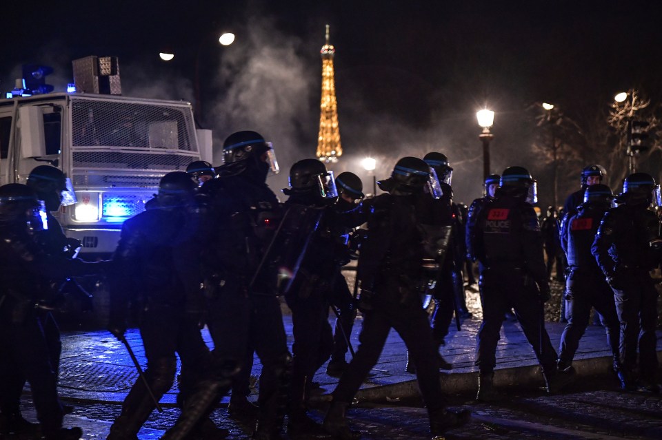 Riot police clashed with protesters in Paris