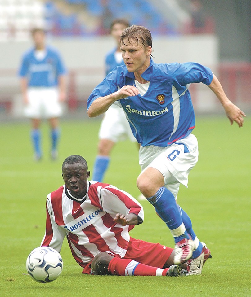 Former Russian international footballer Andrey Solomatin, right, has been recruited