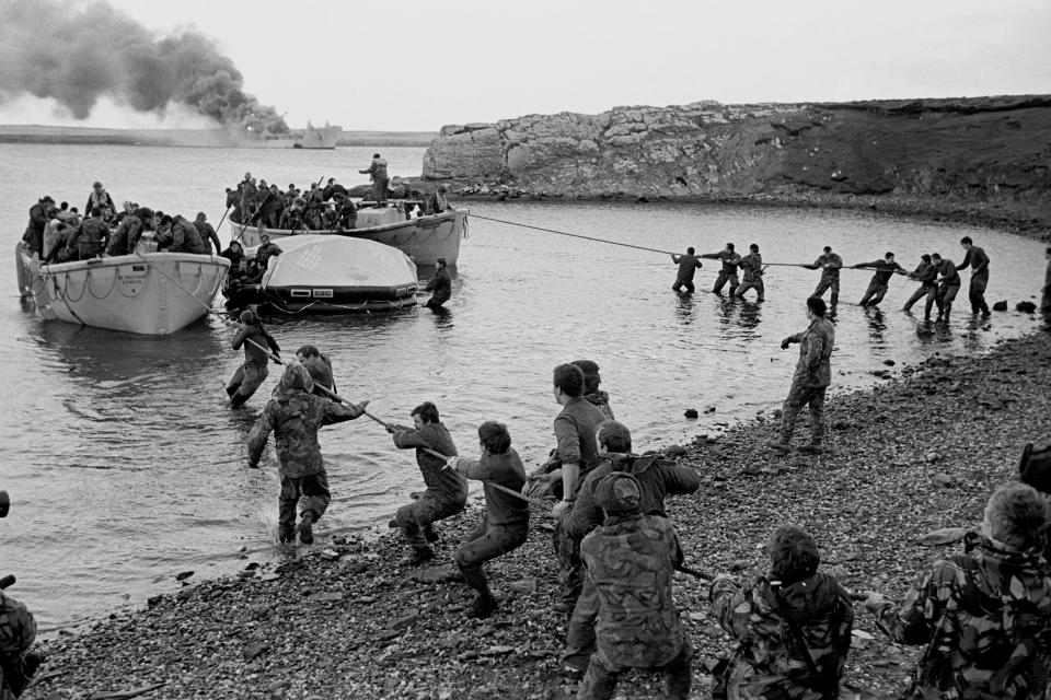 Survivors are hauled ashore after the Sir Galahad was struck in April 1982