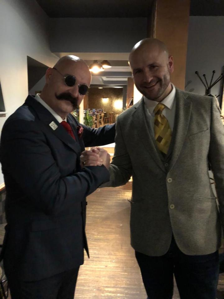 Steve Wraith with a Charles Bronson lookalike at the reception for his marriage to Paula