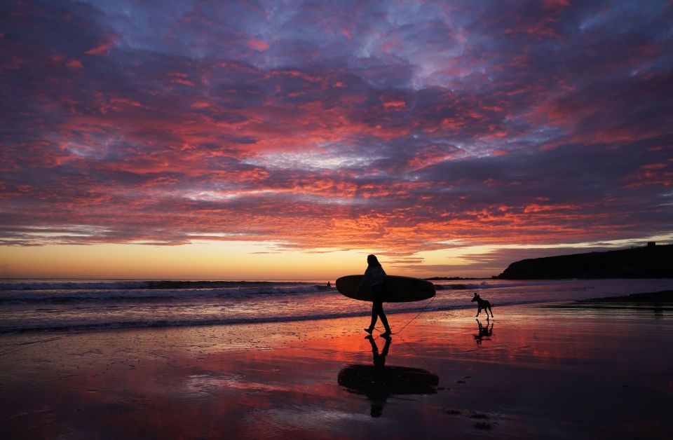 Surfing is a popular activity on the beach year-round