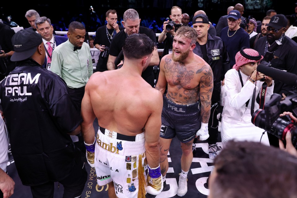 Tommy Fury and Jake Paul embracing post-fight