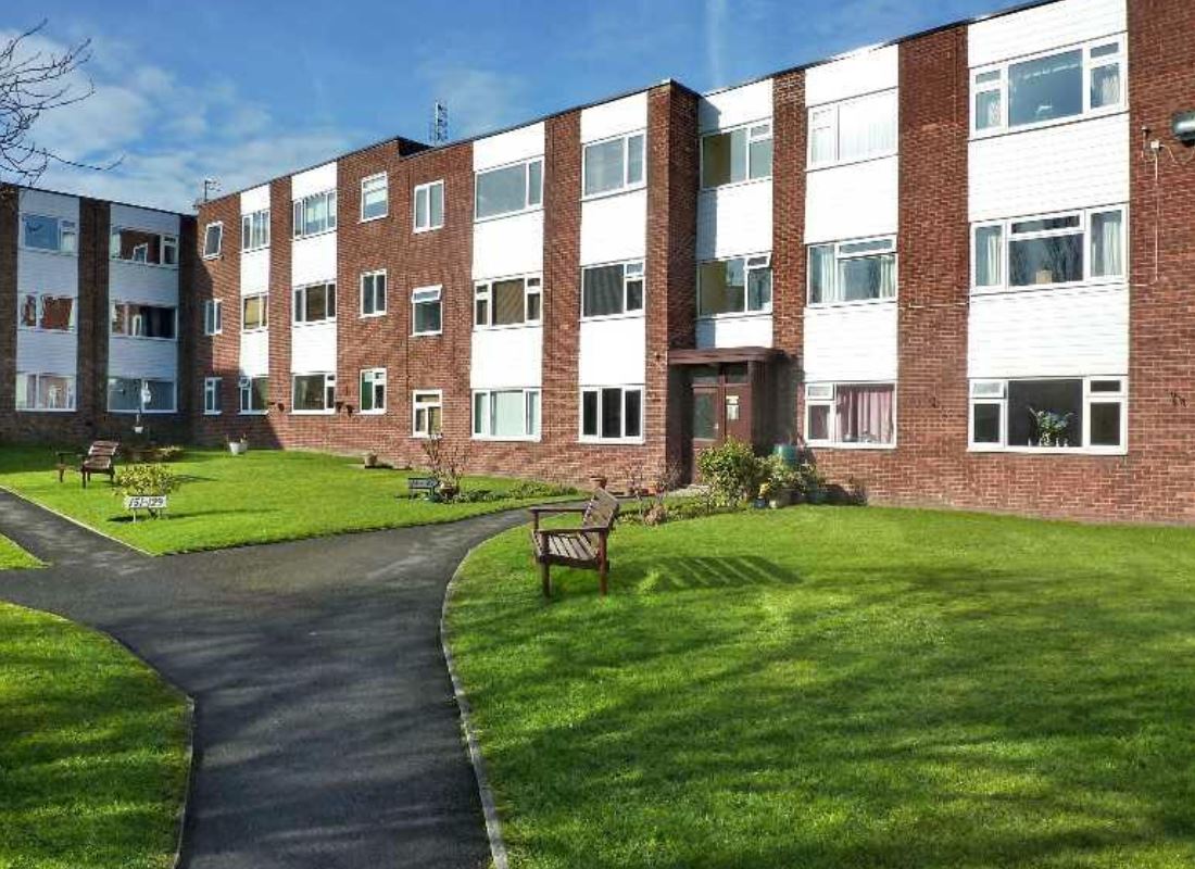 A flat in this block in Bury has been up for sale for £100,000 for 12 years