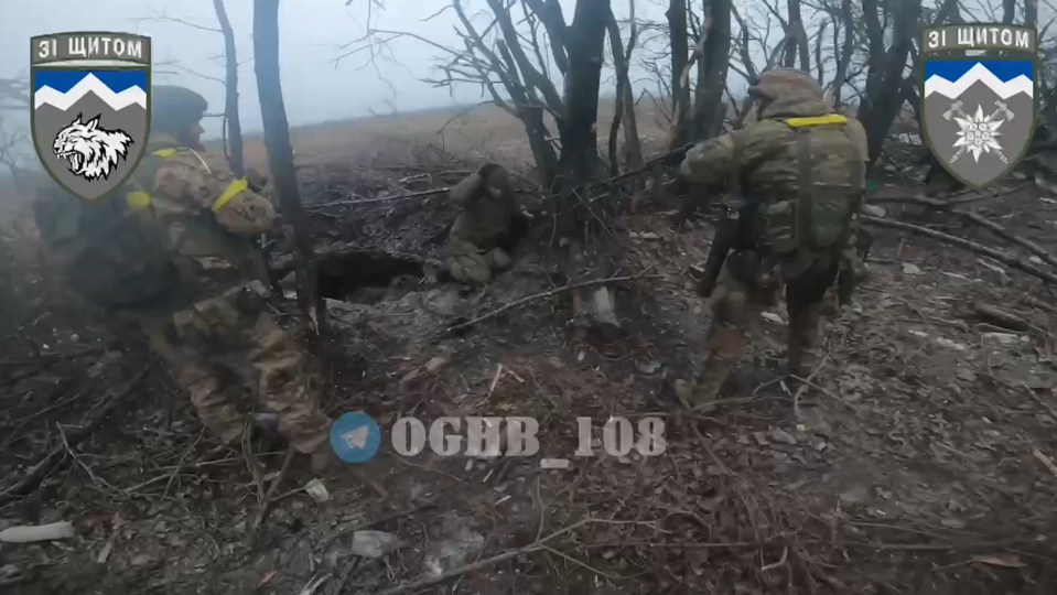 Ukrainian soldiers storming a Russian position