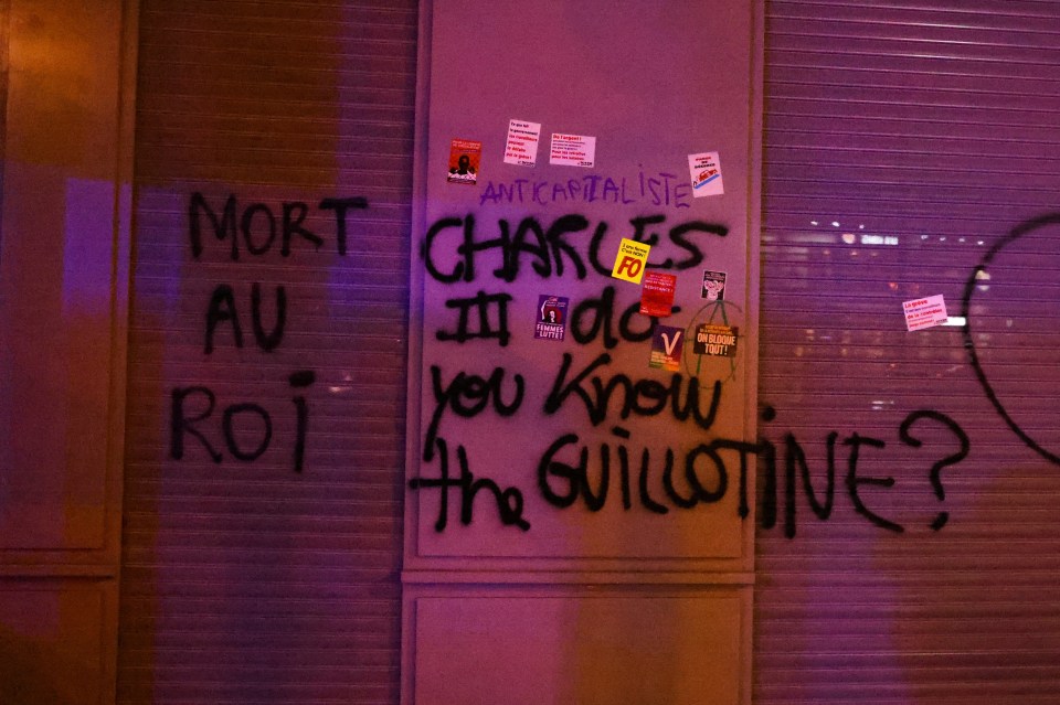 ‘Charles III do you know the guillotine?’ was painted on a wall at Place de la Concorde, where King Louis XVI was guillotined after the French Revolution